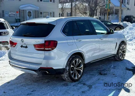 2014 BMW X5 xDrive50I z USA, uszkodzony, nr VIN 5UXKR6C56E0J73696